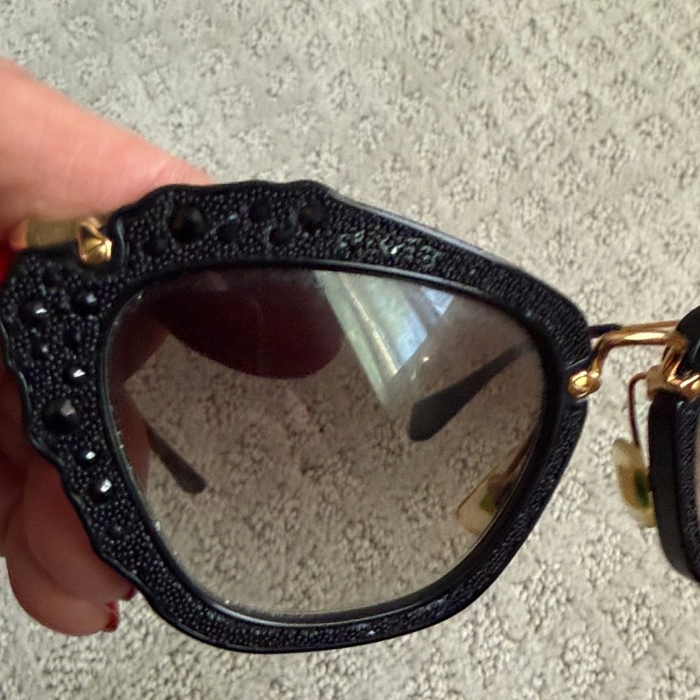 Miu Miu Black Sunglasses with Gold Bridge and Gradient Lenses - Picture 2 of 6